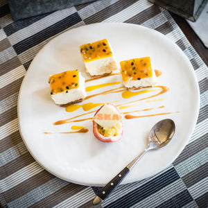 PASSION FRUIT & WHITE CHOCOLATE CHEESCAKE
